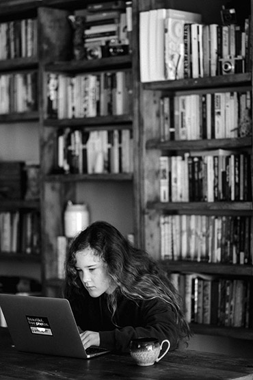 Girl looking at computer